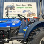 Close up of side view of New Solis 26M (Side Shift) Compact Tractor showing clear floor space