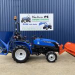 Side view of Solis Compact Tractor with DW Tomlin Front Snowplough and Rear Fleming Gritter