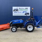 Side view of Solis Compact Tractor with DW Tomlin Front Snowplough and Rear Fleming Gritter