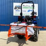 New Maple Spot & Broadcast Sprayer for Compact Tractor shown on the back of a Solis Compact Tractor