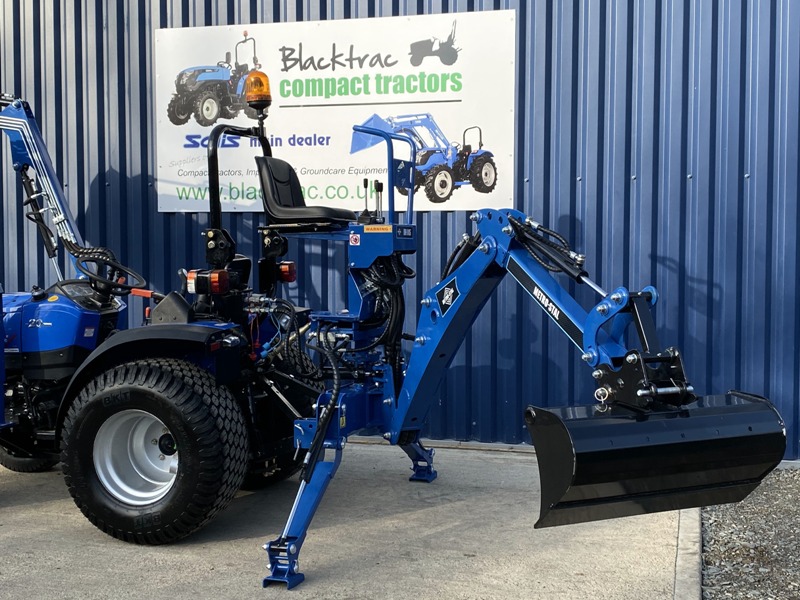 Backhoe for a compact tractor