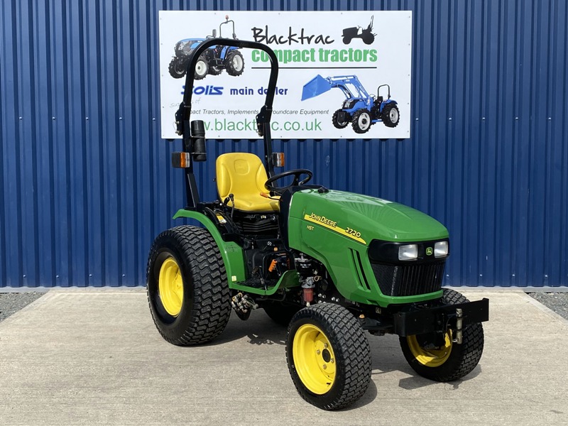 A green and yellow John Deer compact Tractor form Blacktrac.