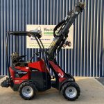 Side view of Norcar A6226 4WD Telescopic Loader with loader raised