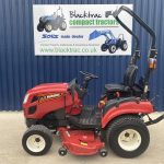 Side view of Shibaura SX26 Compact Tractor with mid mount deck