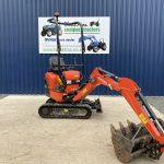 Front view of Kubota 008-3 Mini Digger with digger arm extended