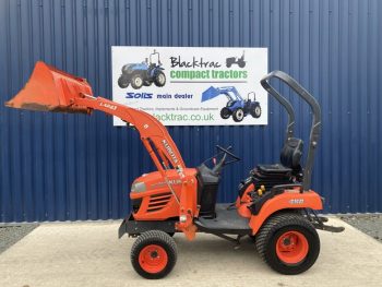 Side view of Kubota BX2350 Compact Tractor with Loader
