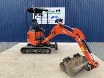 Front view of Kubota U17-3a Mini Digger with digging arm extended