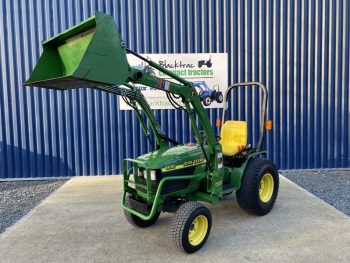 Front view of John Deere 4100 Compact Tractor with Loader