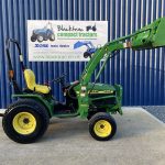 Side view of John Deere 4100 Compact Tractor with Loader