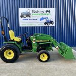 Side view of John Deere 4100 Compact Tractor with Loader