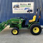 Side view of John Deere 4100 Compact Tractor with Loader