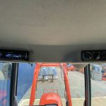 Inside cab view of Kubota B2261 HST Compact Tractor with Kubota LA424 Loader & Bucket