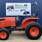 Side view of Kubota L1501 HST Compact Tractor