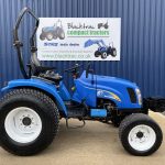 Side view of New Holland TC35DA HST Compact Tractor