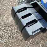 Front weights on New Holland TC35DA HST Compact Tractor