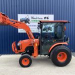 Side view of Kubota B3150 HST Compact Tractor with Loader & Bucket