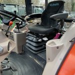 Inside cab of Kubota M8560 Tractor with Kubota LA1354 Loader