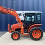 Side view of Kubota L1361 HST Tractor with Kubota LA514 Front Loader & Bucket