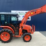 Side view of Kubota L1361 HST Tractor with Kubota LA514 Front Loader & Bucket
