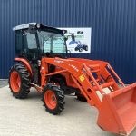 Front view of Kubota L1361 HST Tractor with Kubota LA514 Front Loader & Bucket