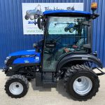 Side view of Solis 26 HST Compact Tractor