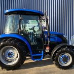 Side view of Solis 50 4WD Tractor with Cab on Agricultural Tyres
