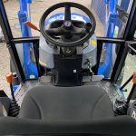 Inside cab of Solis 50 4WD Compact Tractor with Cab & Solis 5500V Loader & Bucket