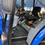 Inside cab of Solis 50 4WD Compact Tractor with Cab & Solis 5500V Loader & Bucket