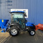 Side view of Solis 26HST Compact Tractor with Snowplough & Gritter