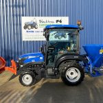 Side view of Solis 26HST Compact Tractor with Snowplough & Gritter