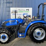 Side view of Solis 50 4WD Compact Tractor on Agricultural Tyres