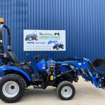 Side view of Solis 26HST Compact Tractor with 4:1 Bucket