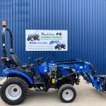 Side view of Solis 26HST Compact Tractor with 4:1 Bucket