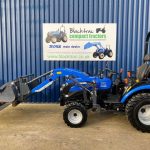 Side view of Solis 26S Compact Tractor with Loader, Hydraulic Grab & Pallet Forks (Loader lowered)