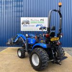 Rear view of Solis 26S Compact Tractor with Loader, Hydraulic Grab & Pallet Forks (Loader lowered)