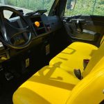 Inside view of cab of John Deere XUV865M 4WD Gator