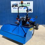 New Fleming 5ft Tipping Transport Box for Compact Tractor shown on the rear of a Solis 26 Compact Tractor