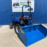 New Fleming 5ft Tipping Transport Box for Compact Tractor shown on the rear of a Solis 26 Compact Tractor