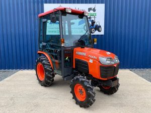 Front view of Kubota B2230 HST 4WD Compact Tractor with Cab