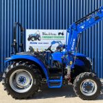 Side view of Solis 50 4WD Compact Tractor with Solis 5500V Loader