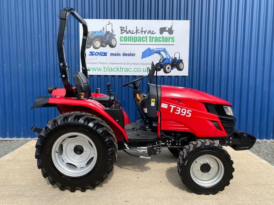 Side view of new TYM T395 4WD Compact Tractor on Industrial Tyres