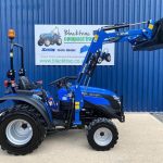 Side view of used Solis 20 Compact Tractor with Front Loader & Bucket with loader raised