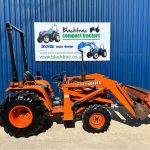 Side view of Kubota B8200 4WD Compact Tractor with Front Loader with loader lowered