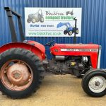 Side view of Massey Ferguson 240 Compact Tractor