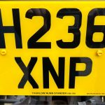 Close up of registration plate of of Massey Ferguson 240 Compact Tractor