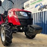 Close up of front weights of Used / Ex Demo TYM T395 4WD Compact Tractor on Agricultural Tyres