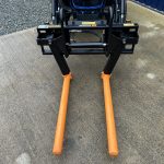 Front view of new Quicke Bale Roller / Handler on Euro Brackets