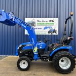 Side view of Solis 26HST Compact Tractor with Loader and Hydraulic Grab Bucket