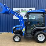 Side view of new Solis 26HST (Hydrostatic) Compact Tractor with Cab, Loader & Grab Bucket