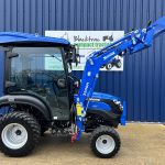 Side view of new Solis 26HST (Hydrostatic) Compact Tractor with Cab, Loader & 4:1 Bucket with loader raised